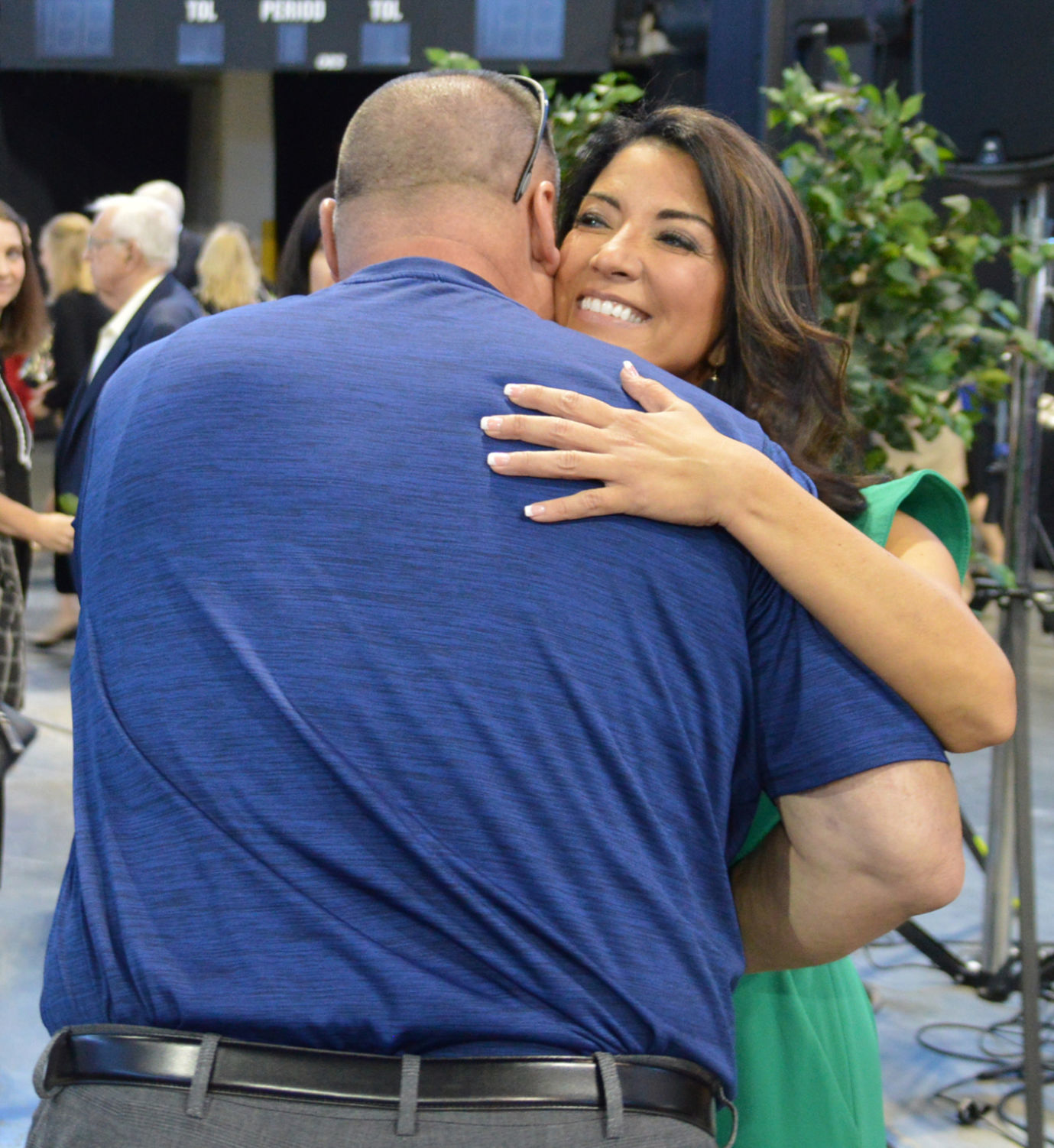 Ava Thomas hugs a guest